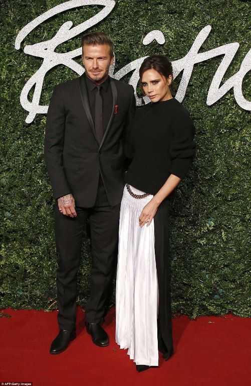2014 British Fashion Awards photo 23A43B2300000578-0-Still_got_it_David_and_Victoria_Beckham_looked_loved_up_at_the_2-27_1417464518302_zpsabceae43.jpg