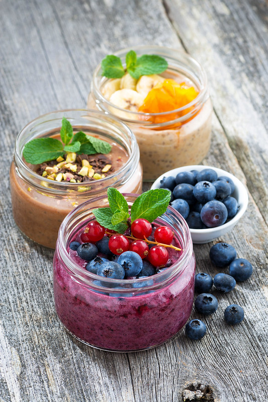 Фото дня assortment breakfast with fresh berries, fruit and chocolate in glass jars