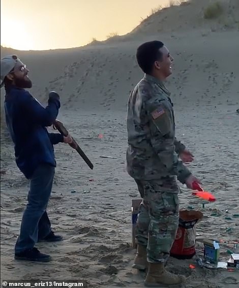 Ну чо, полюбуйтесь на хари убийц шестилетнего мальчика. The 24-year-old is firing a rifle with another male who is dressed in military gear