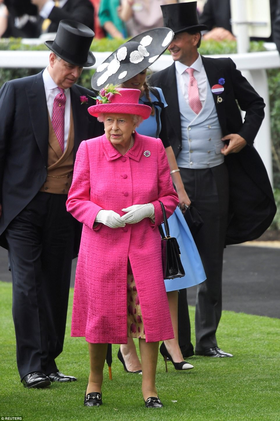 Punters were betting on the Queen choosing pink for Ladies Day and weren't left disappointedÂ 