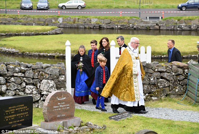 The group followed the priest into the church for the service (pictured), which is their first appearance of the day before they head to lunch at the Old Warehouse in the village of BÃ¸ur